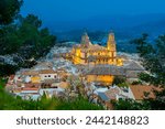 Aerial panoramic view of illuminated Jaen at night