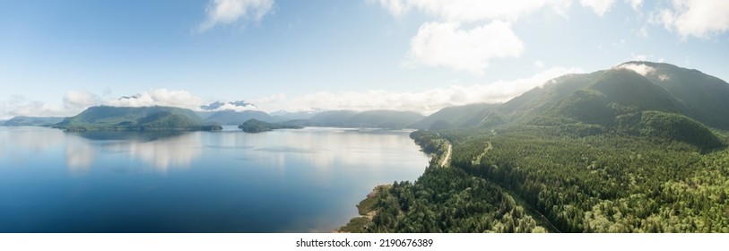 Aerial Panoramic View of Kennedy Lake during a vibrant sunny day. Located on the West Coast of Vancouver Island near Tofino and Ucluelet, British Columbia, Canada. - Powered by Shutterstock