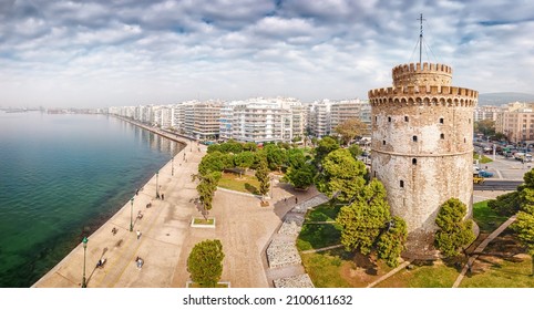Aerial panoramic view of the main symbol of Thessaloniki city and the whole of Macedonia region - the White Tower. Concept of travel destinations in Greece and urban development. - Shutterstock ID 2100611632