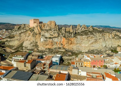 Aerial Panoramic View Of Medieval Ayora Castle Of Arab Origin Currently Under Restoration Above The Town In Spain