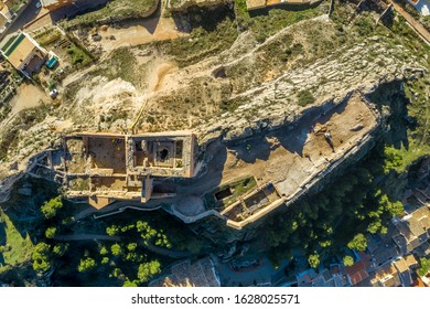 Aerial Panoramic View Of Medieval Ayora Castle Of Arab Origin Currently Under Restoration Above The Town In Spain