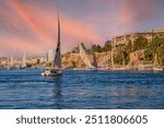 Aerial panoramic view of the Nile river with Feluccas (traditional egyptian sailing boats) in Aswan, Egypt