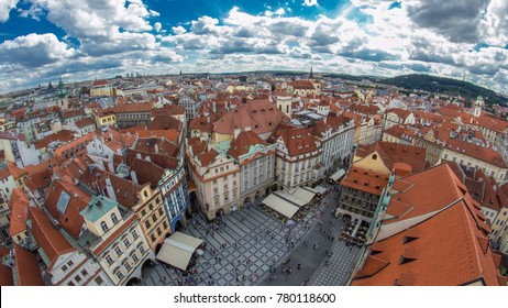 Aerial Panoramic View Of Old Town Square Neighborhood Timelapse In Prague From The Top Of The Town Hall. Cloudy Sky At Summer Day. Fisheye Lens