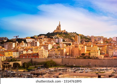 Aerial panoramic view on basilica of Notre Dame de la Garde and old port in Marseille, France. Beautiful photo of the famous european landmark.