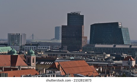 Aerial panoramic view over the  northeast of the downtown of Vienna, capital of Austria, with high-rise office buildings and stadium Ernst-Happel-Stadion in background on dizzy day. - Shutterstock ID 2152815873