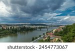 Aerial panoramic view of Prague timelapse from the observation deck of Visegrad. Prague. Czech Republic. Vltava river and bridges. Stormy weather with dark clouds