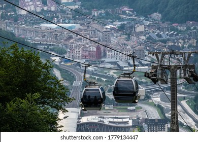 Aerial panoramic view of the Rosa Khutor. Cable Car mountain on a sunny day with blue sky and clouds in summer. Sochi, Russia. Krasnaya Polyana