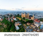 Aerial panoramic view of Rova - Royal palace complex with houses in Antananarivo - capital city of  Madagascar cityscape.