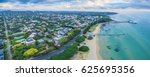 Aerial panoramic view of Sorrento Long Pier, moored passenger ferry and Point Nepean Road at dawn.  Mornington Peninsula, Melbourne, Australia