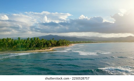 Aerial panoramic view of wild tropical beach El Limon at sunset. Cordillera Central mountain range in the background. Miches, Dominican Republic - Powered by Shutterstock