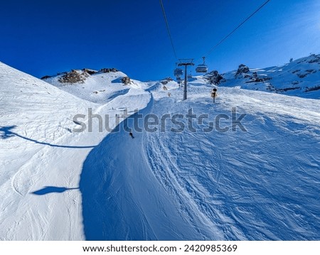 Aerial panoramic winter landscape in Swiss Alps, famous Engelgerg - Titlis ski resort, Switzerland, Europe