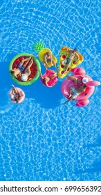 AERIAL People Chilling On Flamingo, Pizza, Pineapple, Watermelon, Doughnut Float