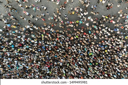 Aerial. People crowd on a city square background. Top view. - Shutterstock ID 1499495981