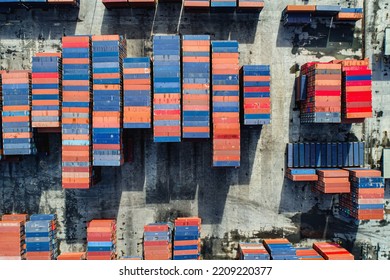 Aerial Perspective Of Container Yard Is Many Containers With Different Colors.