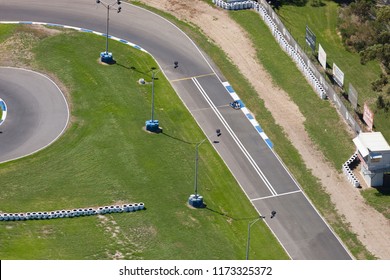 Aerial Perspective Of A Go Cart Racing Track With Driver Practicing Their Laps.