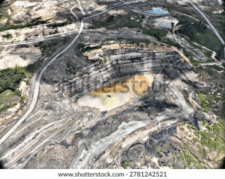 Aerial Perspective of Mining Pit Bench System and Overburden Removal Process in Tropical Region