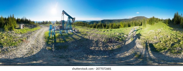 Aerial Photo 360 ° Panoramic Drone Of An Oil And Gas Field In Ukraine, The Carpathians, Ivano-Frankivsk Region, The Village Of Dora Near The City Of Yaremche. Oil Pumps Among Wild Forests