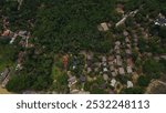 aerial photo above a small town in anyer, with residences and vegetations