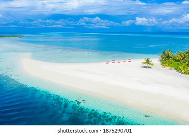 Aerial Photo Of Beautiful Maldives Paradise Tropical Beach. Amazing View, Blue Turquoise Lagoon Water, Palm Trees And White Sandy Beach. Luxury Travel Vacation Destination. Sunny Aerial Landscape
