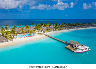 Aerial Photo Of Beautiful Maldives Paradise Tropical Beach. Amazing View, Blue Turquoise Lagoon Water, Palm Trees And White Sandy Beach. Luxury Travel Vacation Destination. Sunny Aerial Landscape