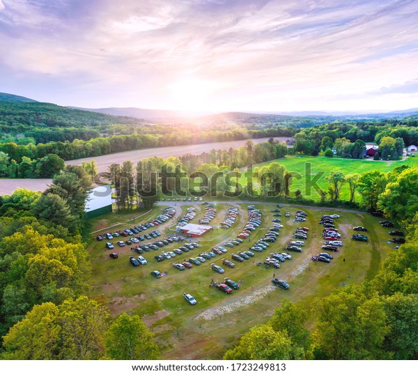 Aerial\
photo of beautiful outdoor country drive-in movie theater at\
sunset. Taken at Northfield Drive-In\
Theater.
