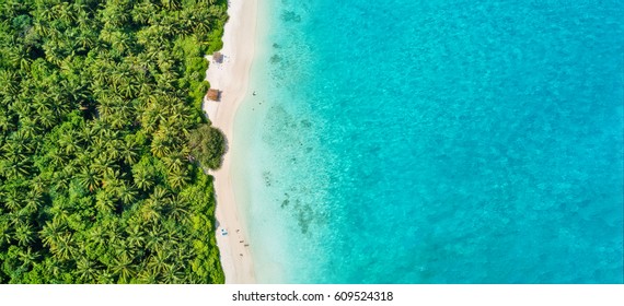 Aerial Photo Of Beautiful Paradise Maldives Tropical Beach On Island. Summer And Travel Vacation Concept.