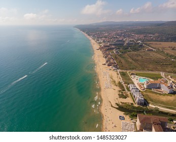 Aerial photo of the beautiful small town and seaside resort known as Obzor in Bulgaria showing the coastal hotels and people relaxing and having fun on the golden sunny beach of the Black Sea coast - Shutterstock ID 1485323027