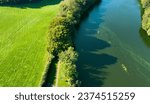 Aerial photo of Blue-green algae on The River Bann from Lough Neagh at Portna Lock Kilrea County Derry Antrim Northern Ireland   