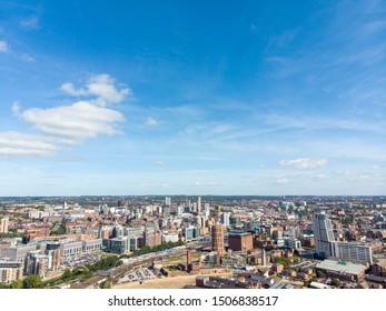 Aerial photo of the British town of Leeds in West Yorkshire UK, showing the Leeds City Centre taken with with a drone on a bright sunny day in the town of Holbeck near to the centre.