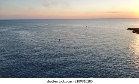 Aerial Photo Of A Canoe Race In Salento