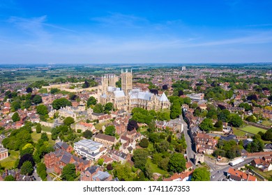 Aerial photo of the city centre of Lincoln and Lincoln Cathedral, Lincoln Minster in the city centre of Lincoln on a bright sunny summers day showing the historic Cathedral Church in the city centre