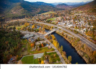 Aerial photo of the city of Rogue River Oregon, Interstate highway I5 and the concrete arch bridge over the Rogue River - Shutterstock ID 1414044782