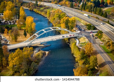 Aerial photo of the city of Rogue River Oregon, Interstate highway I5 and the concrete arch bridge over the Rogue River - Shutterstock ID 1414044788