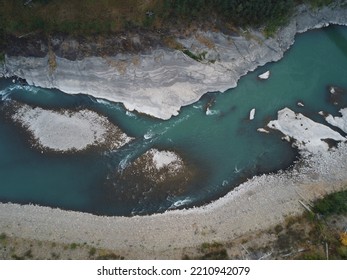 Aerial Photo Of Cowlitz River. Top Down, Drone, Blue River Bend, Rock Banks.