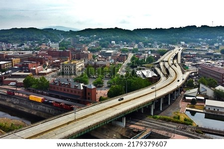 Aerial photo of Cumberland, Maryland with interstate 68 and train tracks.