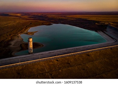 Aerial Photo Drying Up In The Reservoir At Sunset  In Crimea Republic