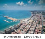 Aerial photo of harbour Naufragos Acequion, residential houses, highways and Mediterranean Sea of Torrevieja. High angle view famous popular travel destination. Costa Blanca. Alicante province. Spain.