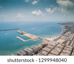 Aerial photo of harbour Naufragos Acequion, residential houses, highways and Mediterranean Sea of Torrevieja. High angle view famous popular travel destination. Costa Blanca. Alicante province. Spain.