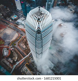 Aerial Photo In Hong Kong Skyline In Spring, With Sea Of Clouds. IFC. International Finance Corporation