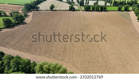 Aerial photo of a large ploughed field in Ireland