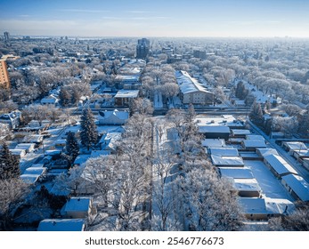 Aerial photo of the Nutana neighborhood in Saskatoon, Saskatchewan, highlighting historic homes, tree-lined streets, parks, and scenic views of the South Saskatchewan River in this vibrant community. - Powered by Shutterstock