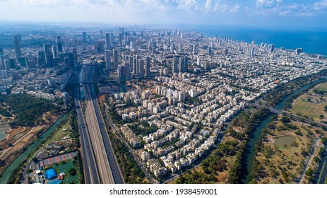 Aerial photo of the oceanside city of Tel Aviv Yafo. Taken from deep inland the photo shows the whole city from the north including park hayarkon the waterfront the business district and major highway