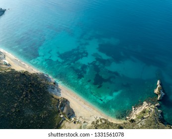 aerial photo of one of the most visited beaches in Albania. showing the beautiful patterns of the sea bottom . photo taken in saranda , mirror beach , plazhi pasqyrave, pasqyra plazh