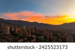 aerial photo over a wonderful sunset in the city of Medellin, 