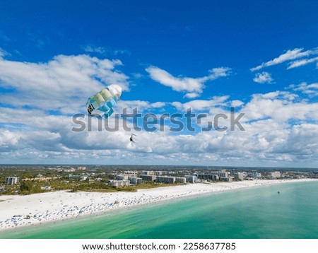 Aerial photo parasailing on the beach