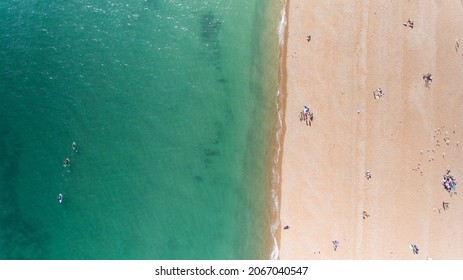 Aerial photo of people at Brighton beach during summer in Sussex England