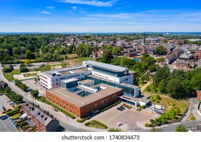 Aerial Photo Of The Pontefract Hospital Located In The Village Of Pontefract In Wakefield In The UK On A Sunny Summers Day Showing The Hospital And Grounds With A Blue Sky And White Clouds In The Sky