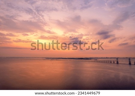 Aerial photo of Qingdao Jiaozhou Bay Cross Sea Bridge under suns