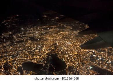 Aerial Photo Of Rome City In Italy. Airplane View At Night