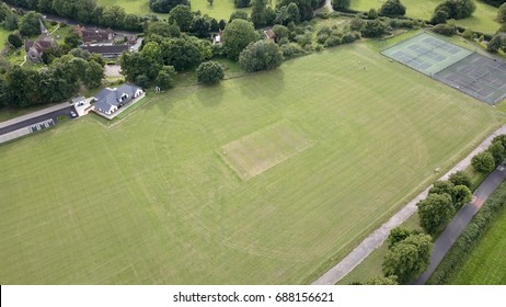 Aerial Photo Rural English Village Cricket Pitch And Pavilion